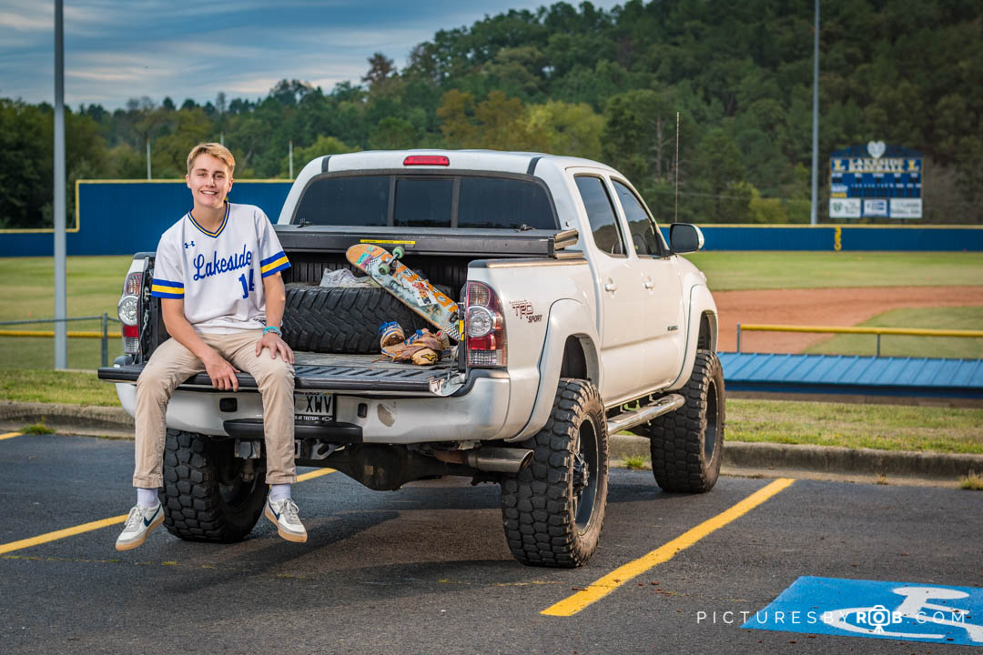 Karsten Senior Pics - his truck and all his toys